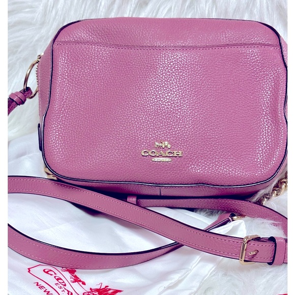 Coach Handbags - EUC Coach Camera Leather Crossbody Pink Bag with Tassle